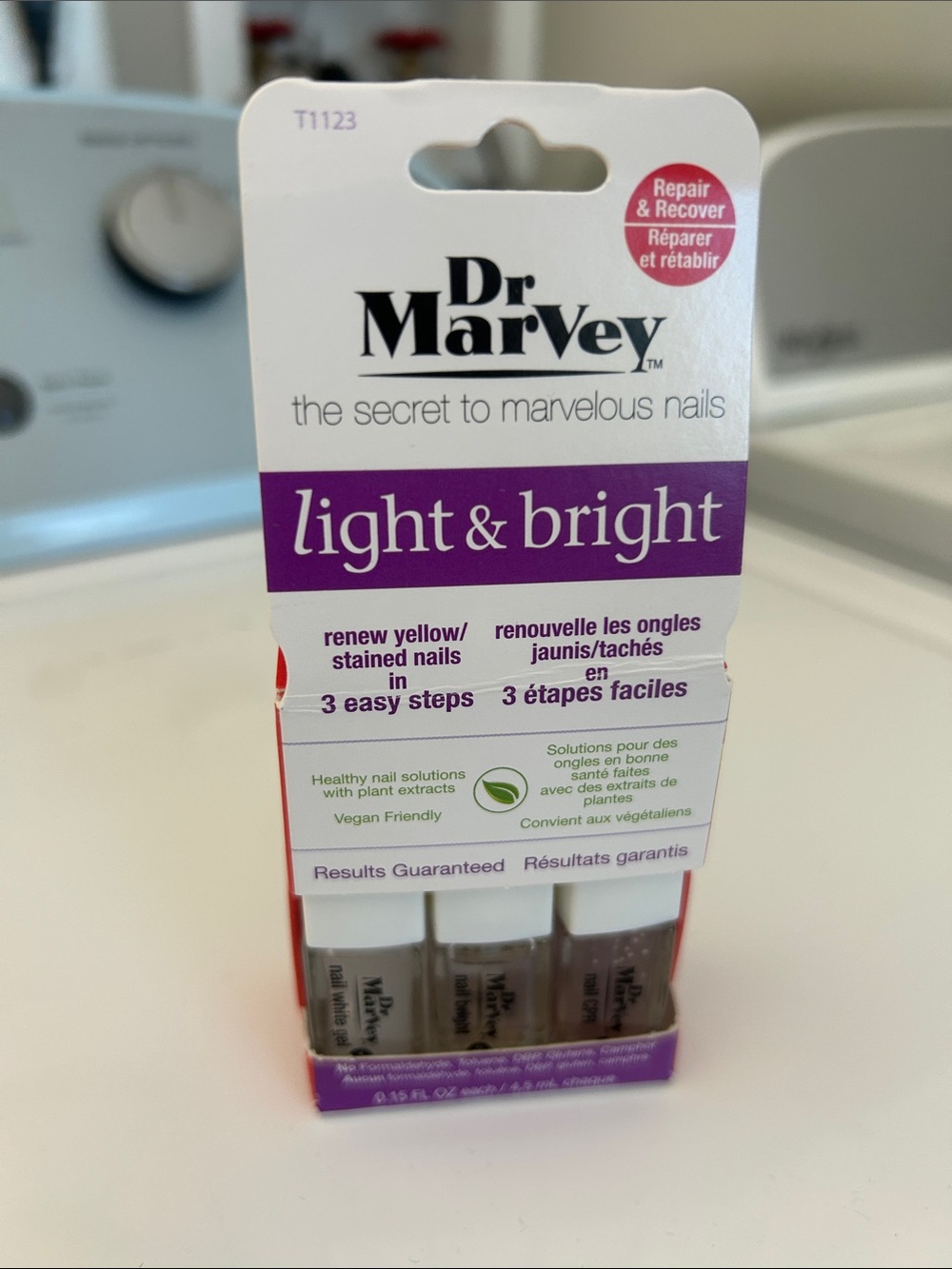 Light & Bright Nail Treatment - White and Purple Packaging
